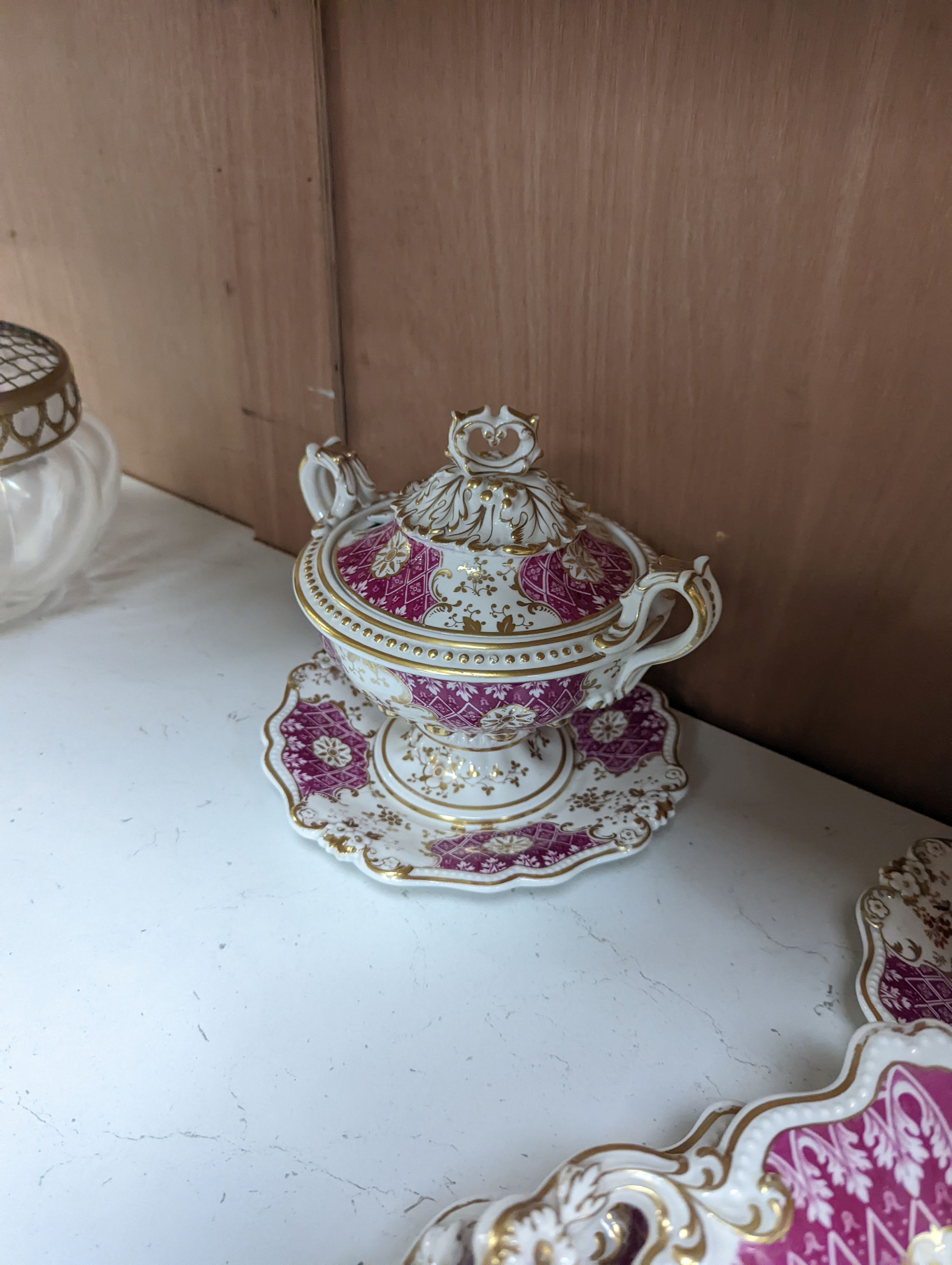 A Ridgways porcelain topographical part dessert service, c.1835, pattern number 2168, the sauce tureens and covers pattern number 2179
